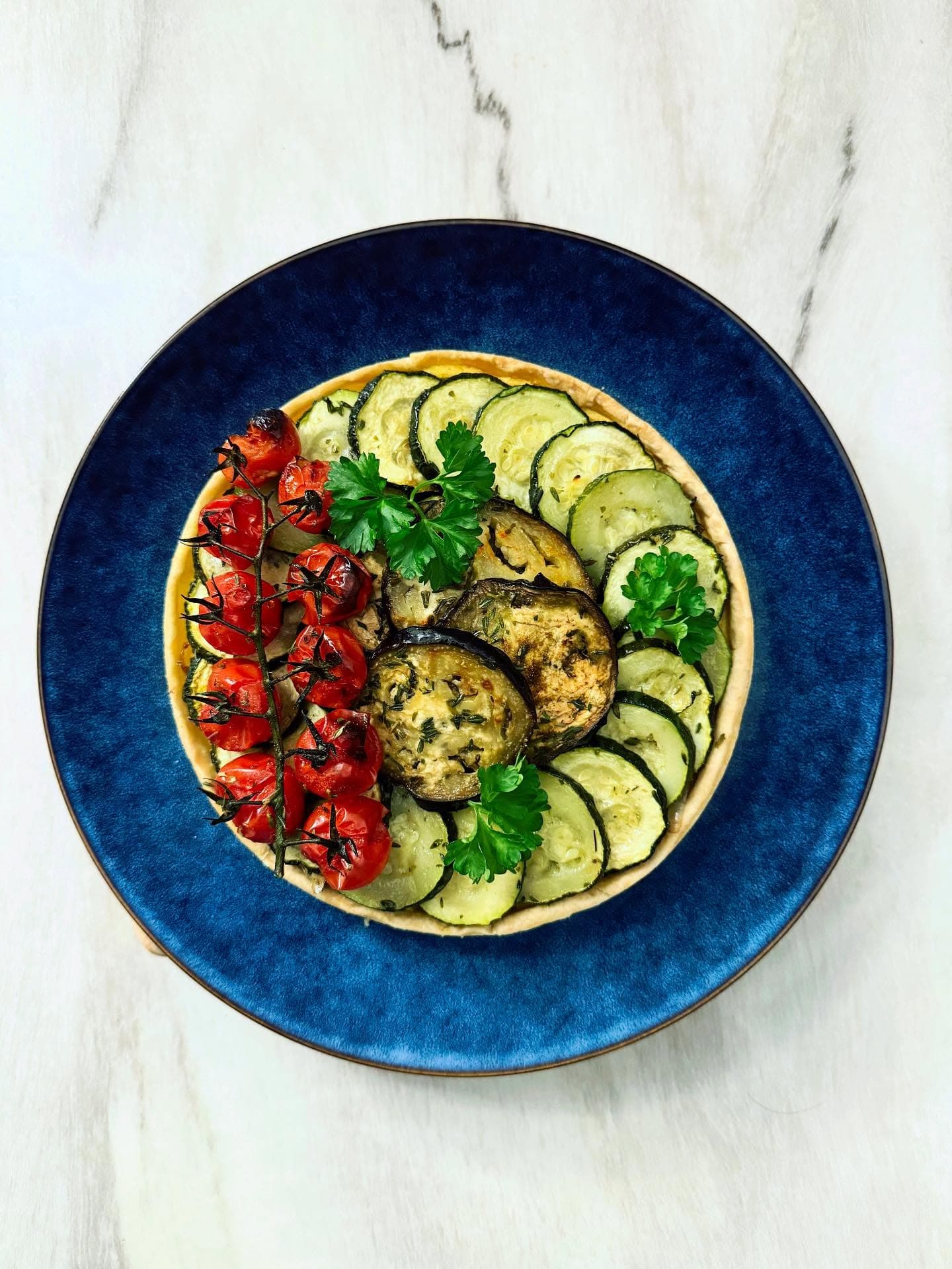 Vegetarian quiche with Comté, turmeric and roasted vegetables