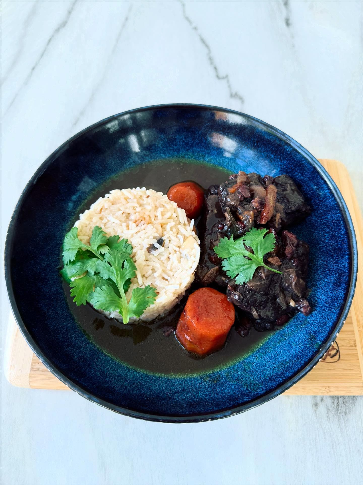 Boeuf bourguignon with warm spices and cumin mushroom pilaf