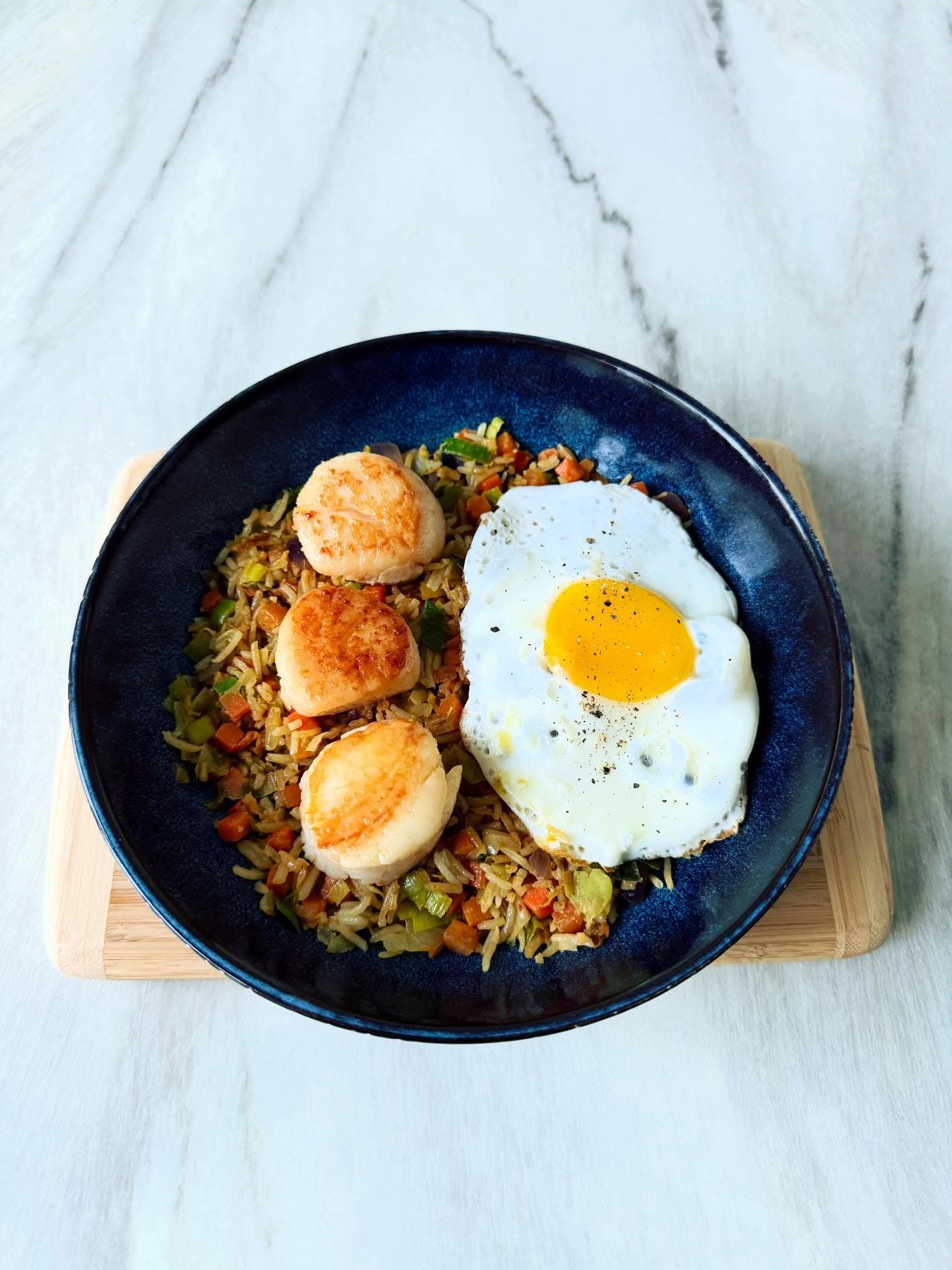 Seared scallops with nasi goreng spiced fried rice