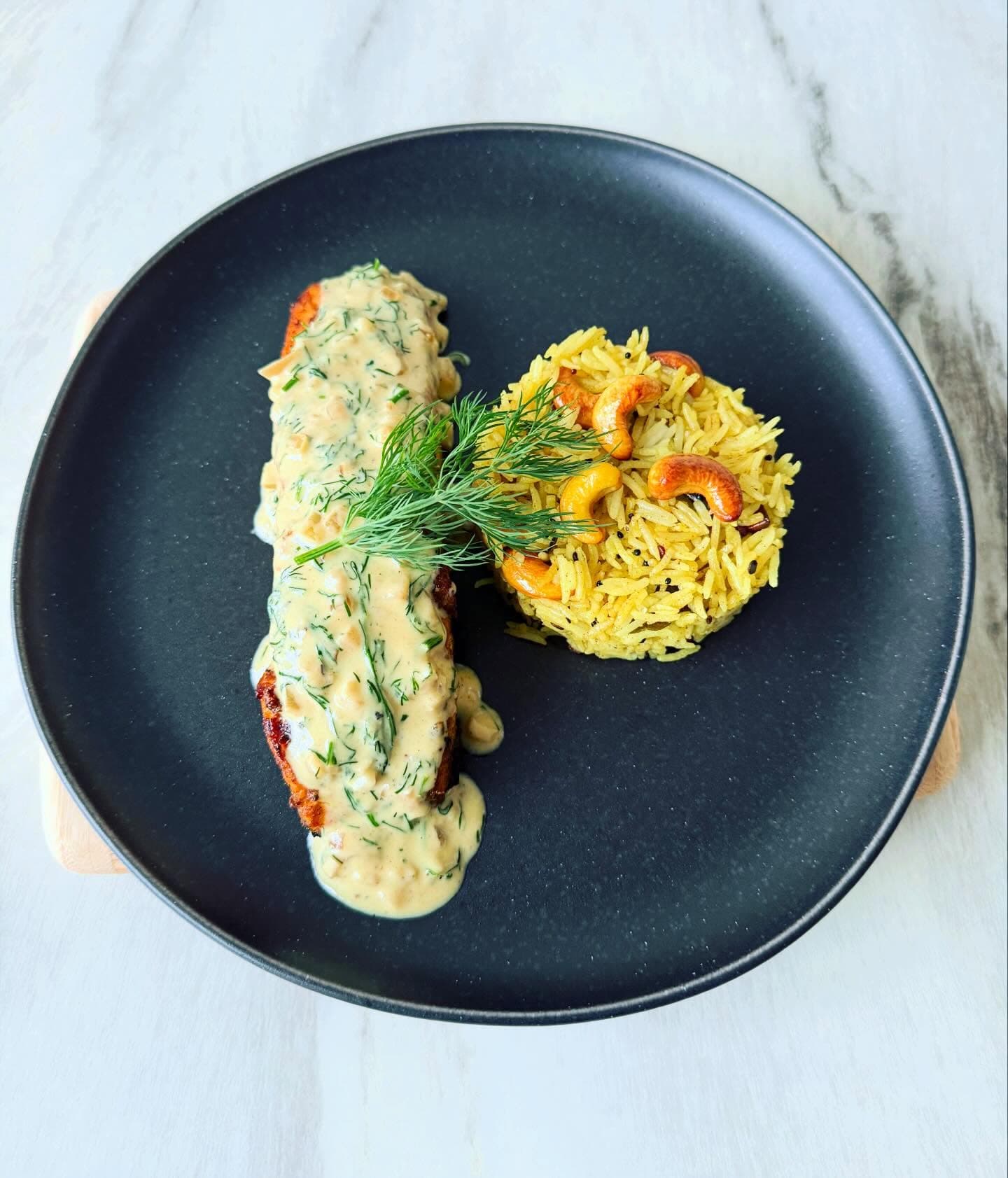 Tandoori salmon with dill cream and lemon basmati rice