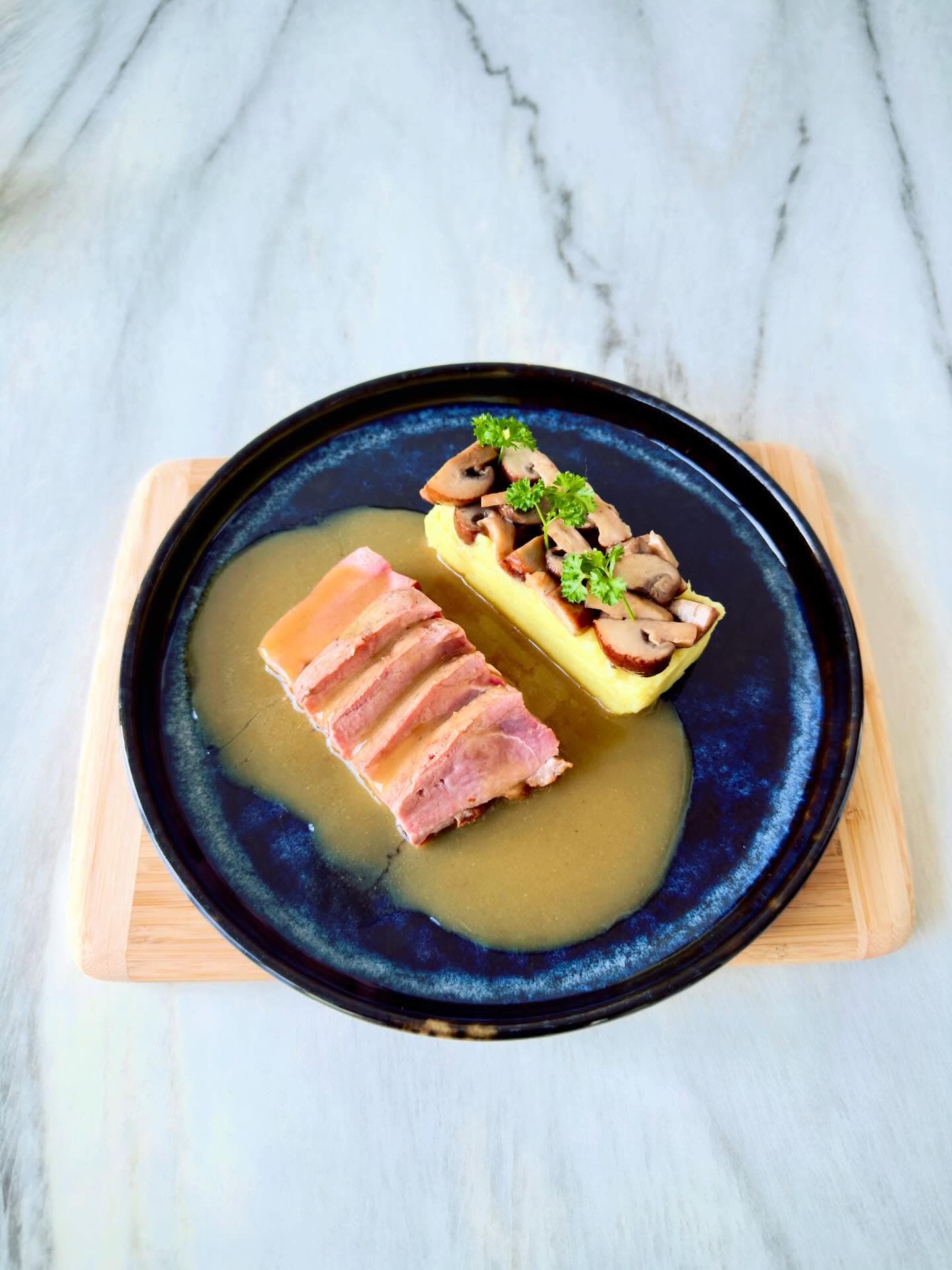 Duck breast with batata purée and tamarind jus