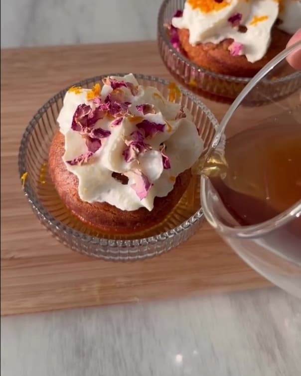 Baba Jamun soaked in Indian spiced syrup with cardamom whipped cream