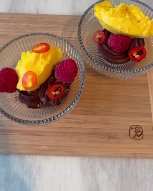 Ice and fire dessert with mango ginger ice cream and chocolate chilli mousse
